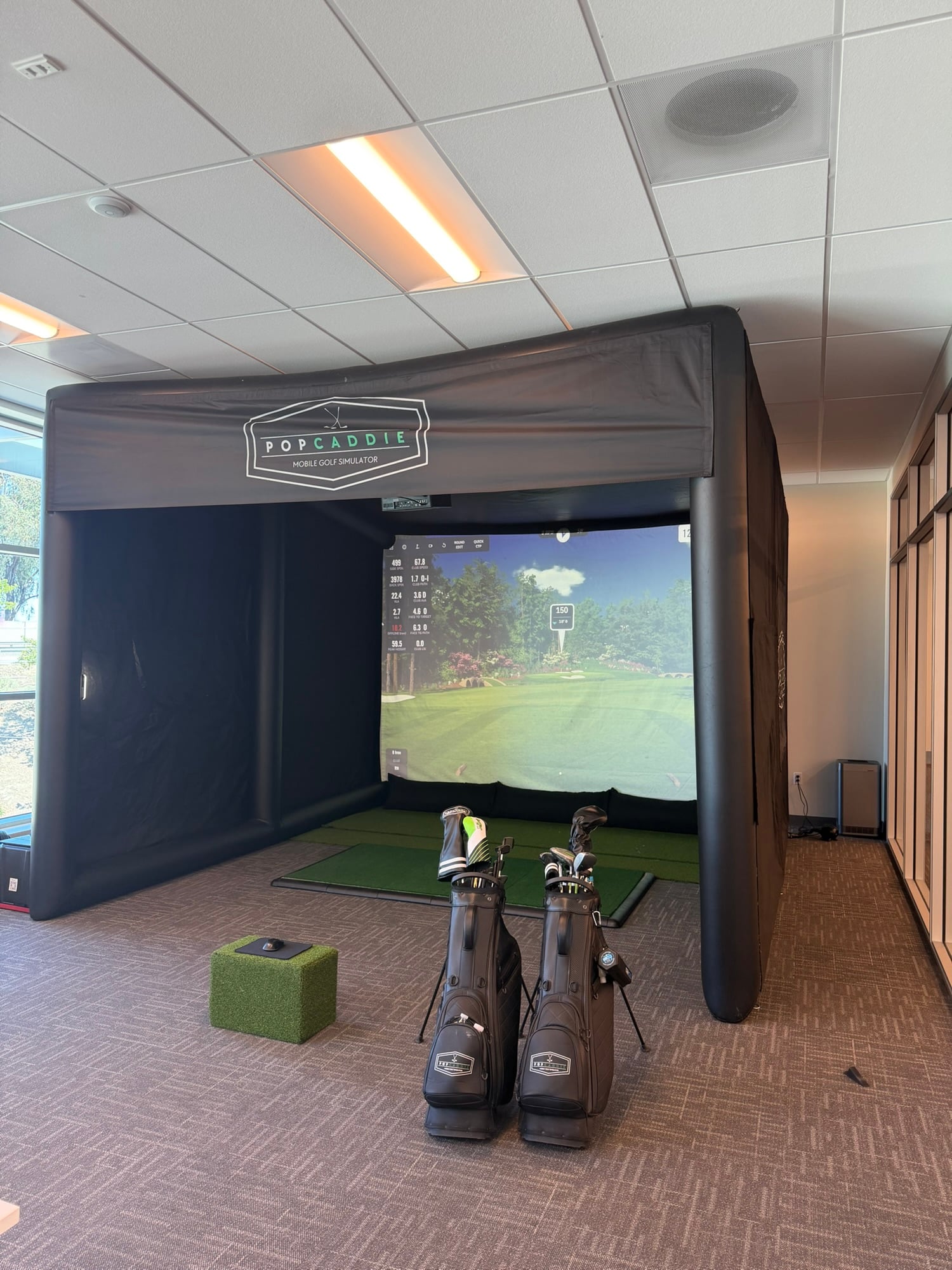 PopCaddie golf simulator charity fundraiser event Riverside California